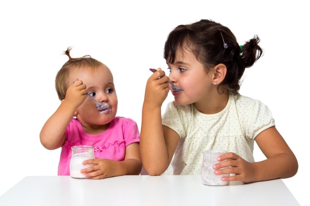 Baby and Toddler Eating Yogurt