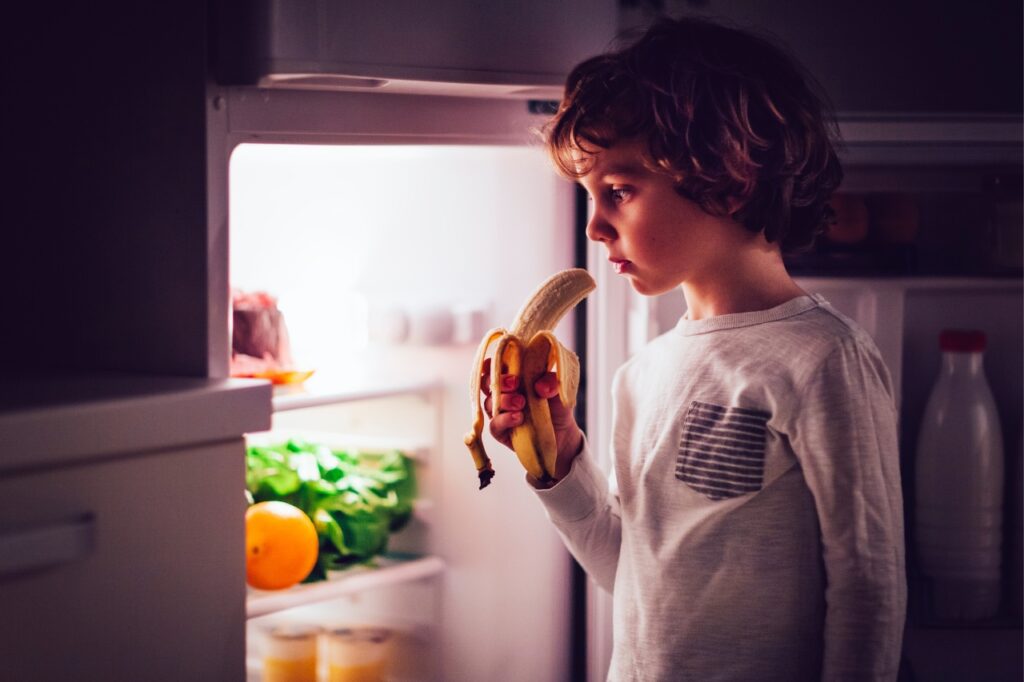 Kid Eating a Bedtime Snack